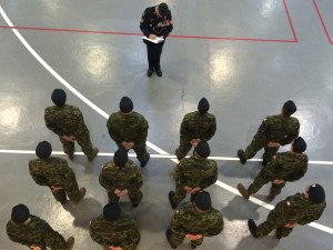 A Staff Seargant takes roll call. 