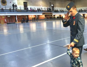 A young boy and his father.